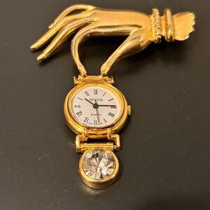 Geneva Gold Hand Brooch with Watch and Crystal